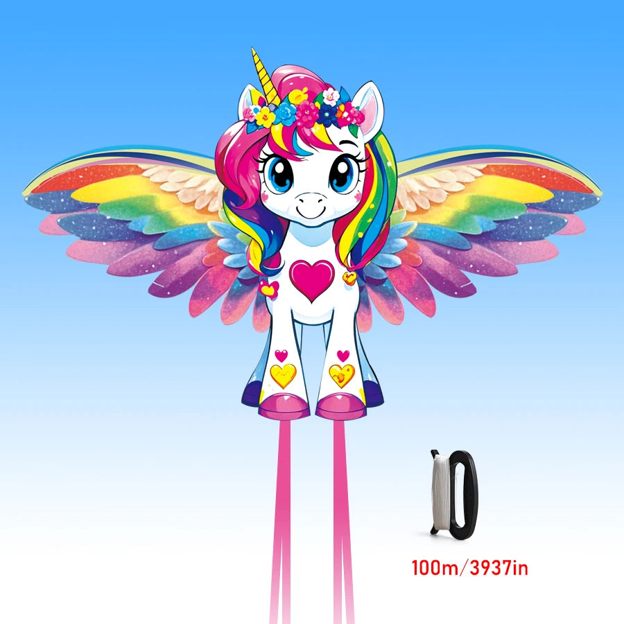 Colorful unicorn kite with rainbow wings on a blue background