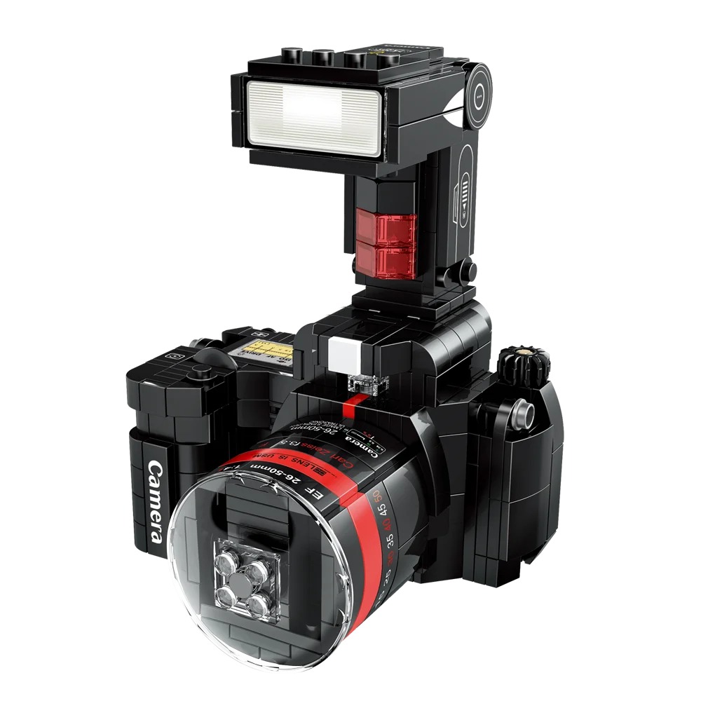 Toy camera model made of interlocking bricks on a white background