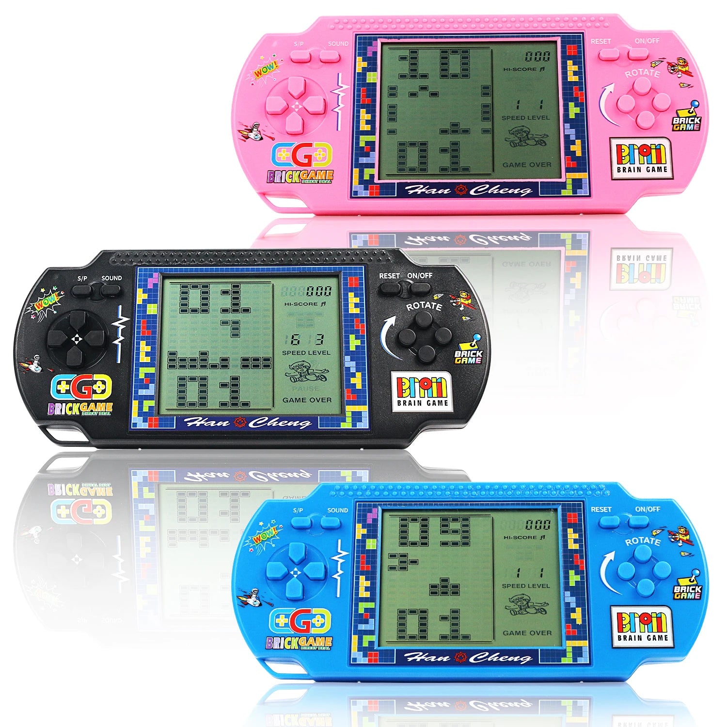 Three handheld electronic games with colorful displays and 'Han Cheng' branding on a reflective surface.