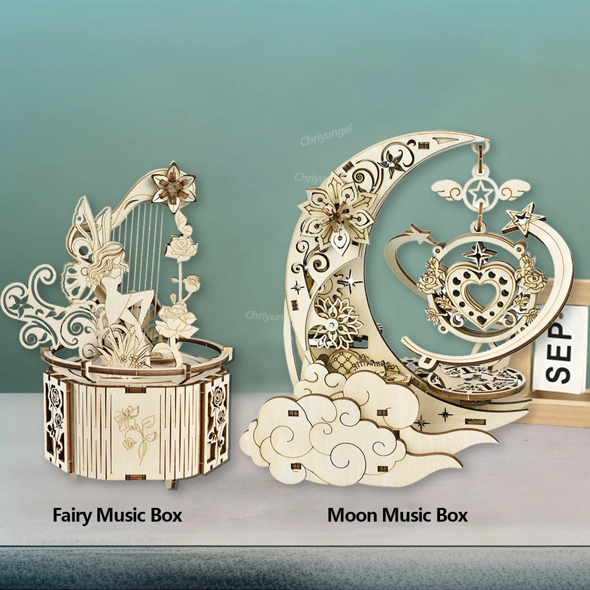 Fairy and Moon music boxes on a gradient background