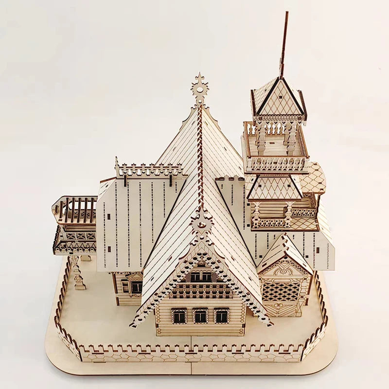 Wooden model of a detailed architectural structure on a white background