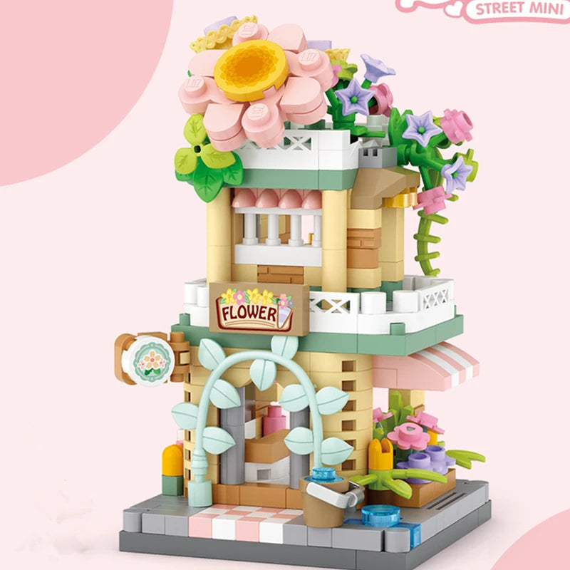 Toy building set with floral design on a pink background