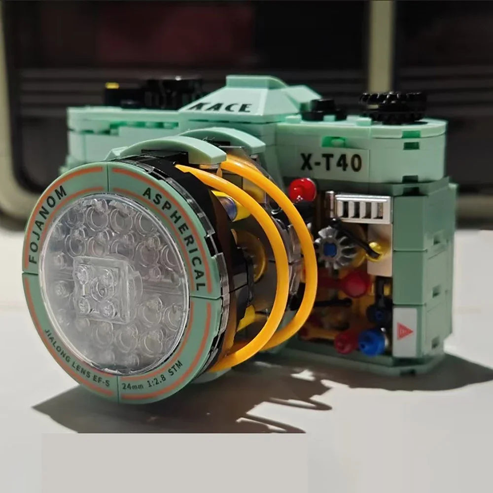 Model camera made of interlocking bricks with detailed components.